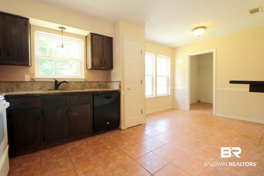820 West Section Avenue Foley, AL 36535 - Photo 26 of 47 Kitchen to Dining