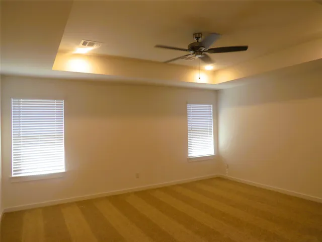 a bathroom with a sink double vanity and a mirror