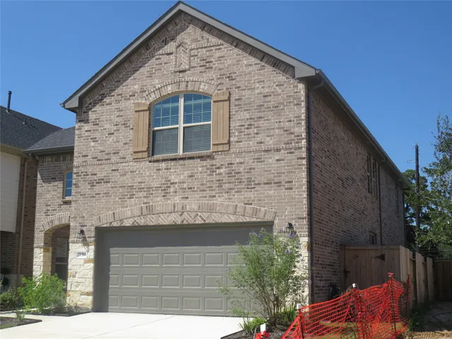 a front view of a house with balcony