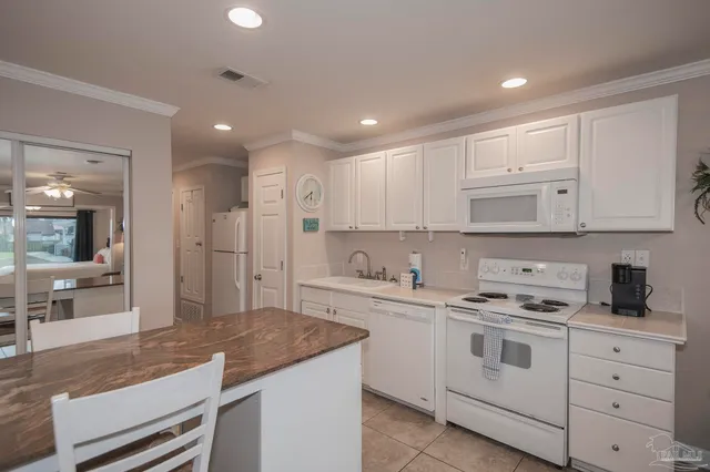 $330,000 | 7453 Sunset Harbor Drive, Unit 102, Navarre Beach, FL 32566