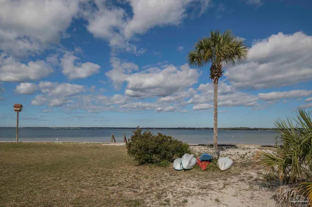 $330,000 | 7453 Sunset Harbor Drive, Unit 102, Navarre Beach, FL 32566