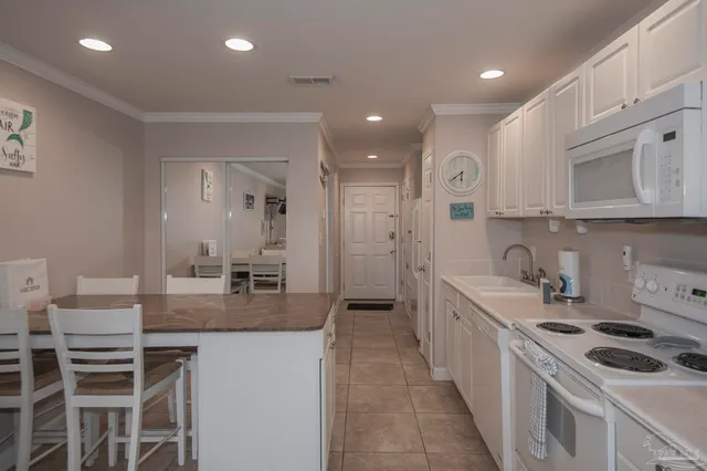 $330,000 | 7453 Sunset Harbor Drive, Unit 102, Navarre Beach, FL 32566