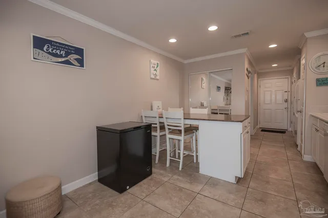 $330,000 | 7453 Sunset Harbor Drive, Unit 102, Navarre Beach, FL 32566
