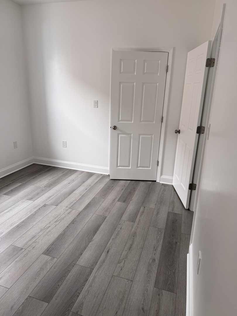 2101 Gunderson Avenue, Unit 2 Berwyn, IL 60402 - Photo 10 of 11 a view of empty room with wooden floor
