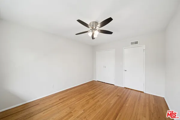 a view of a big room with wooden floor