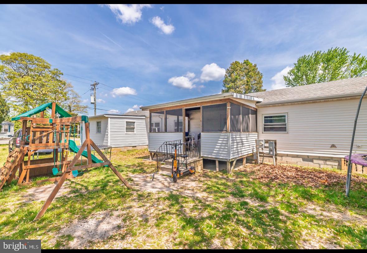 36372 Old Mill Road Ocean View, DE 19970 - Photo 5 of 14 a house view with a garden space