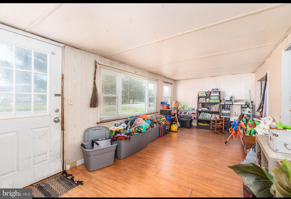 36372 Old Mill Road Ocean View, DE 19970 - Photo 6 of 14 a living room with furniture and a window