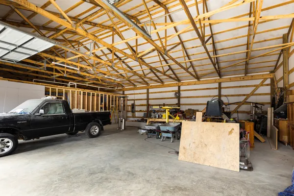 a view of parking garage with cars