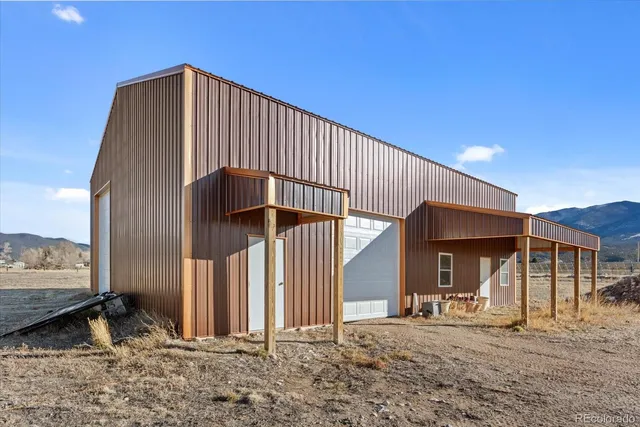 a backyard of a house with seating space