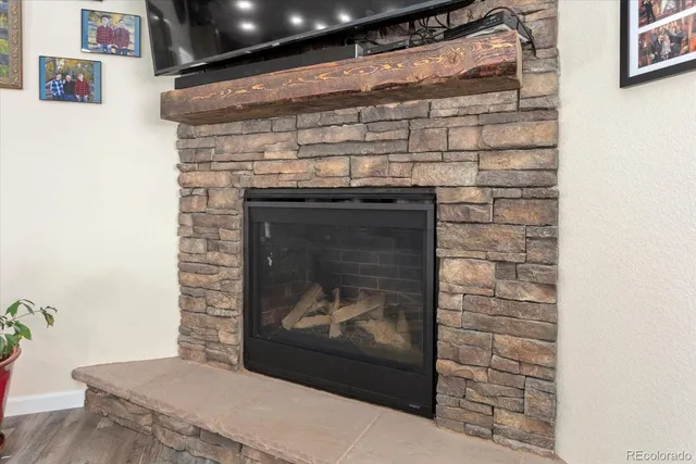 a fireplace with a wooden floor
