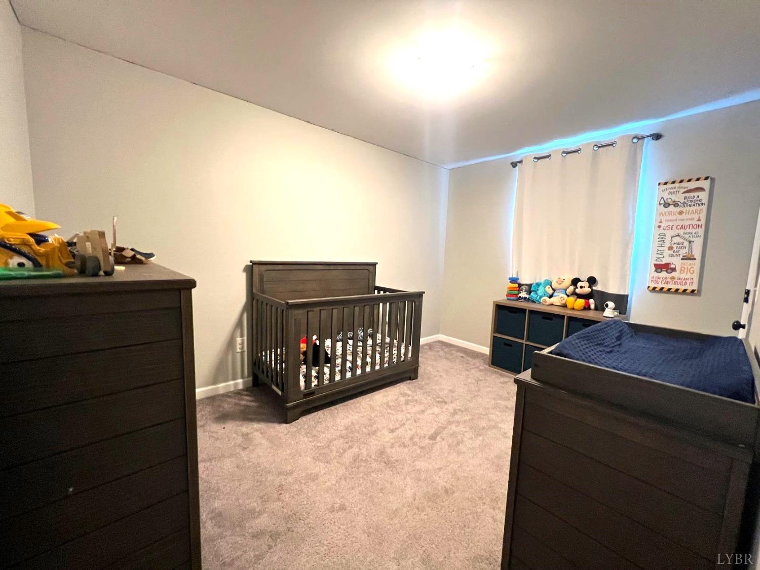 1226 Mountain Cut Road Appomattox, VA 24522 - Photo 13 of 22 a bedroom with furniture and a window