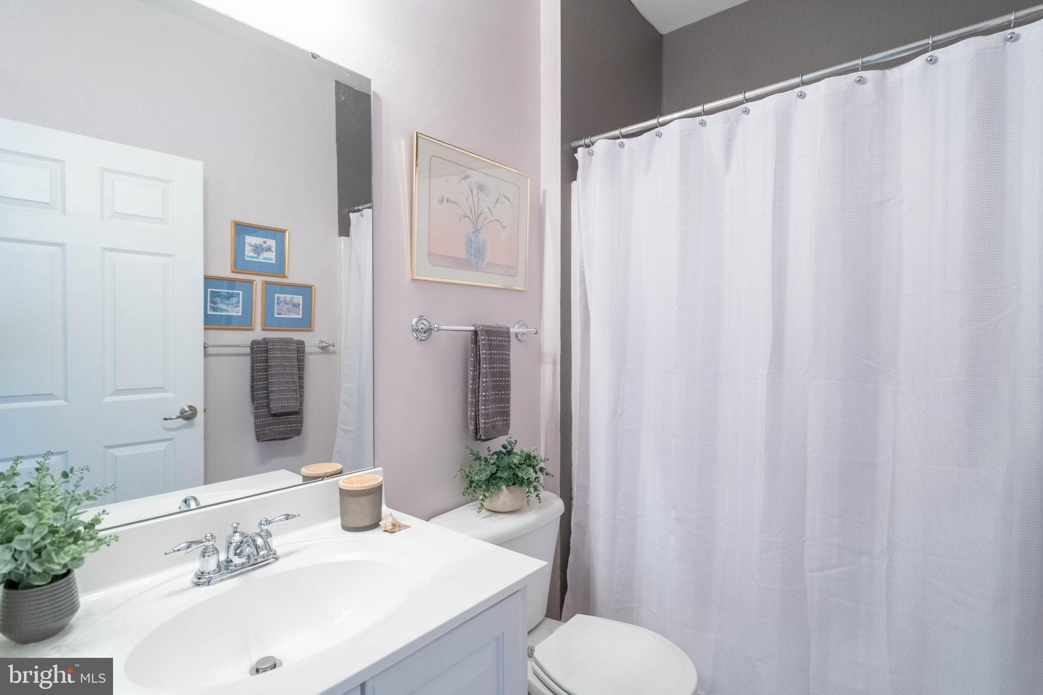 31823 Skimmer Road Ocean View, DE 19970 - Photo 13 of 52 Main Bathroom off Foyer