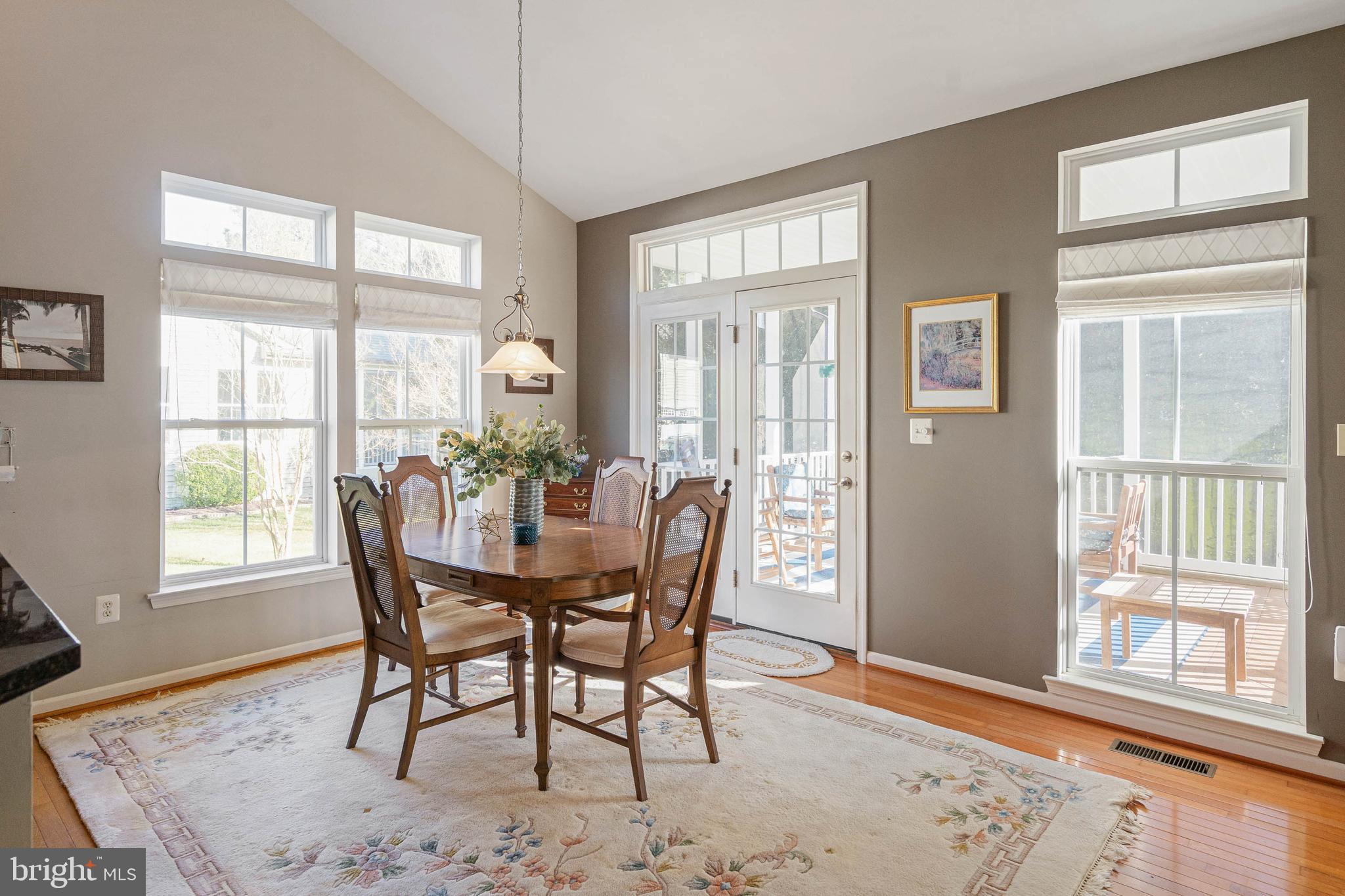31823 Skimmer Road Ocean View, DE 19970 - Photo 19 of 52 Dining Room leading to Screened Porch