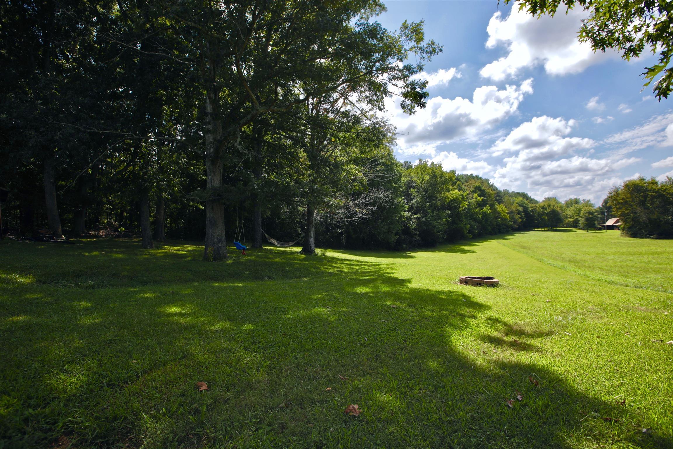 2674 New Hall Road Greenbrier, TN 37073 - Photo 4 of 30 a view of a green field with wooden fence