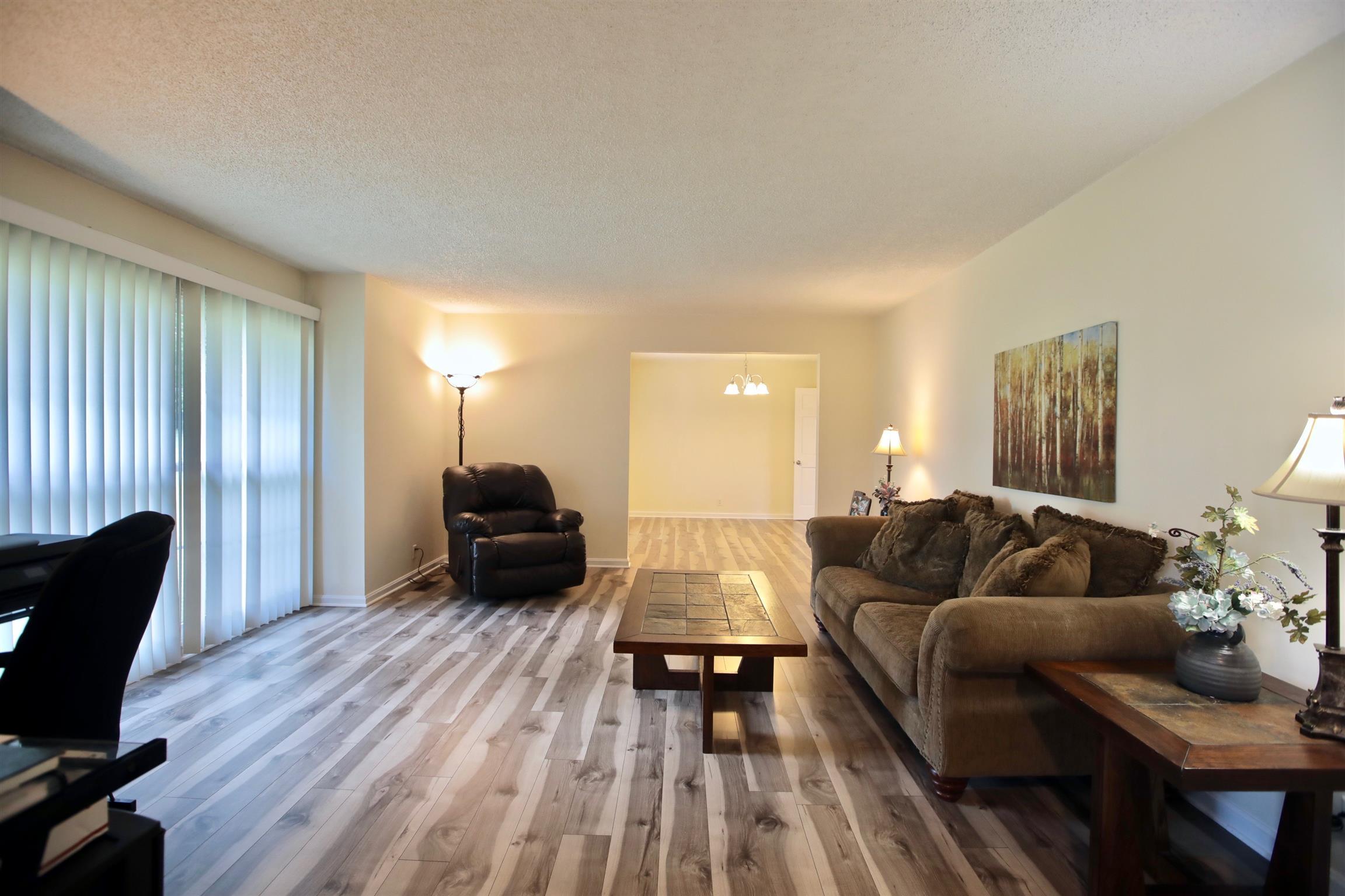 2674 New Hall Road Greenbrier, TN 37073 - Photo 8 of 30 a living room with furniture and a wooden floor