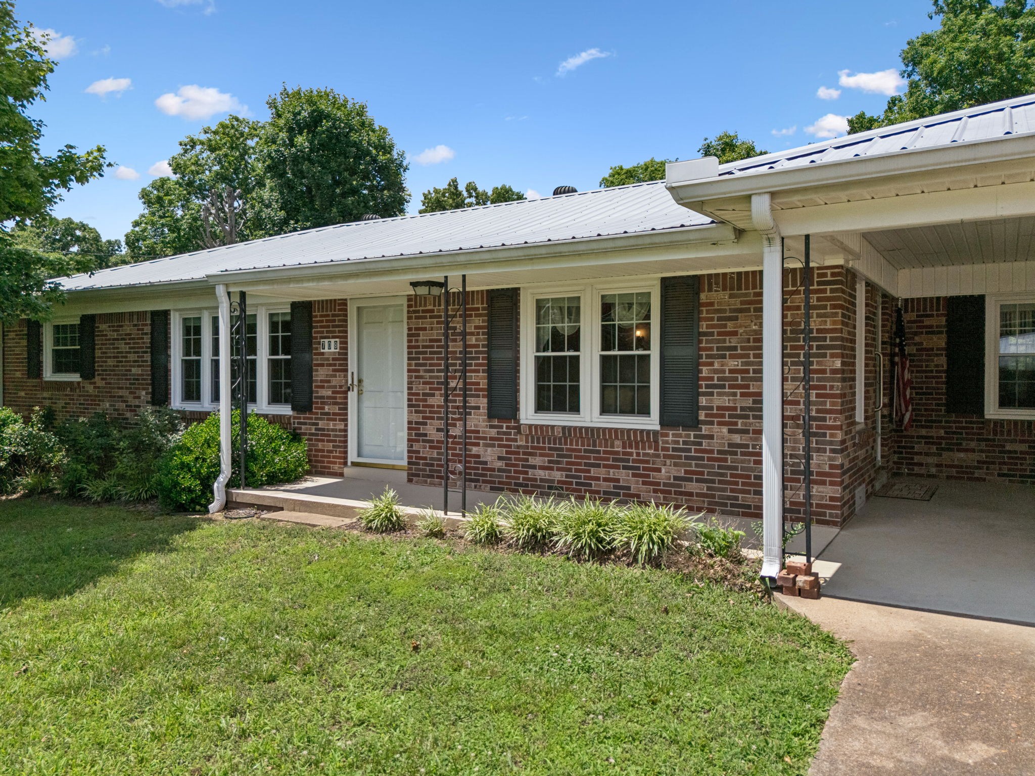 708 Hickory Street Centerville, TN 37033 - Photo 51 of 57 front view of a house with a yard