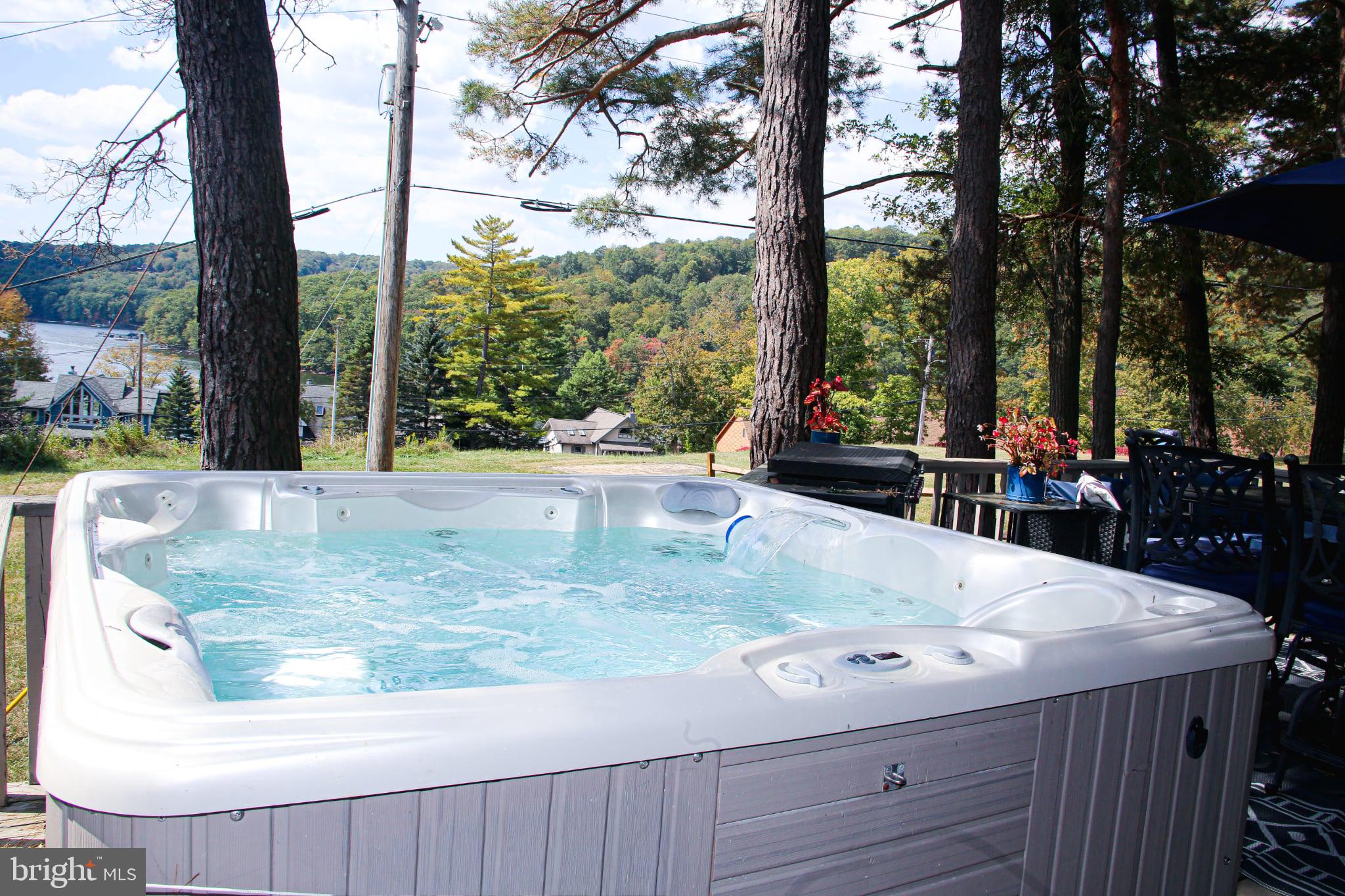 120 Rock Lodge Road McHenry, MD 21541 - Photo 20 of 23 hot tub with lake views