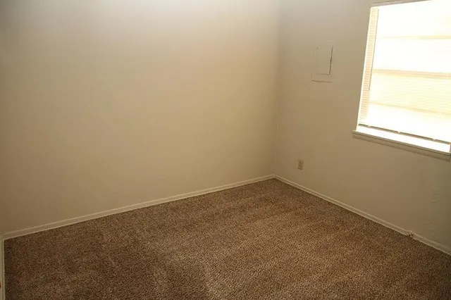 an empty room with a window