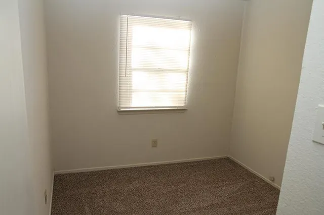 a bathroom with a sink a toilet and bathtub