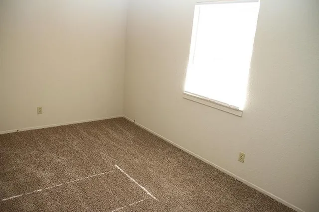 an empty room with a window