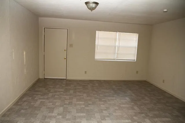 an empty room with a window