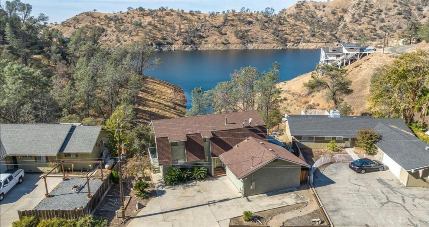 27817 Sky Harbour Road Friant, CA 93626 - Photo 23 of 36 an aerial view of a house with a yard and a fountain