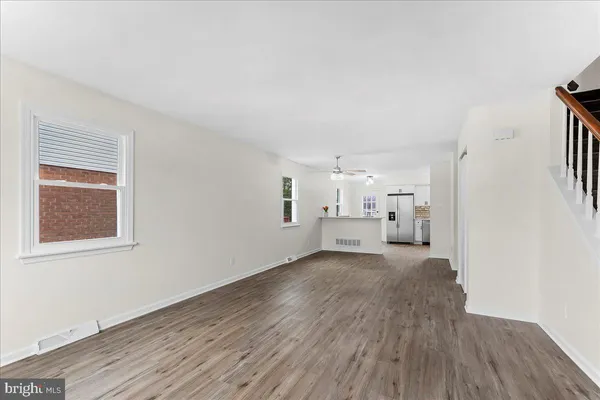 a view of a livingroom with wooden floor