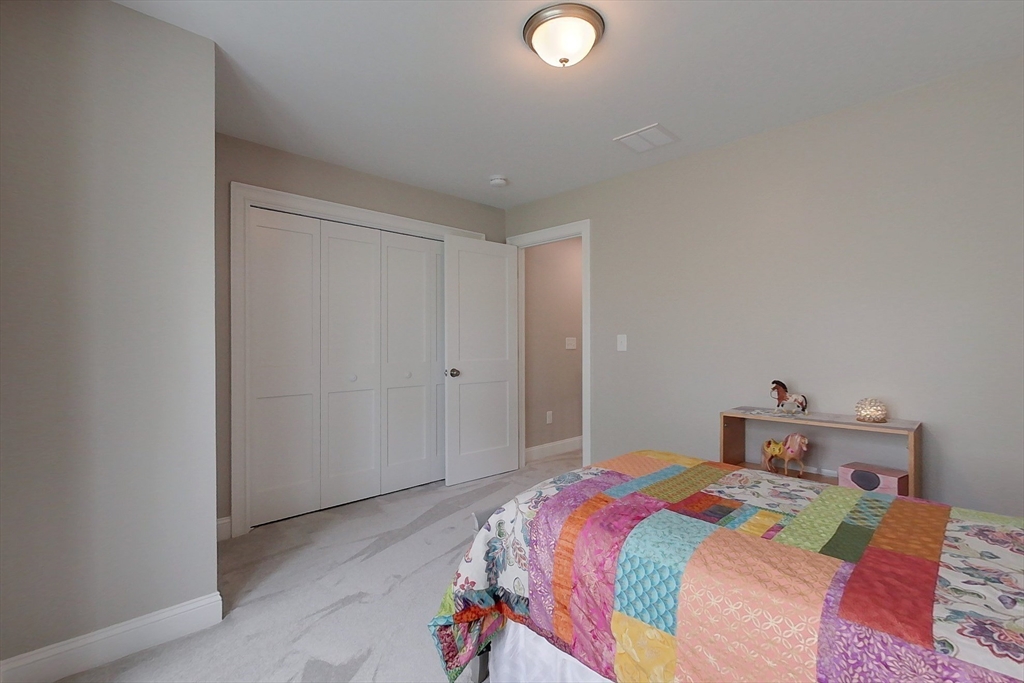 531 Clark Street Gardner, MA 01440 - Photo 26 of 42 a bedroom with a bed and a cabinets