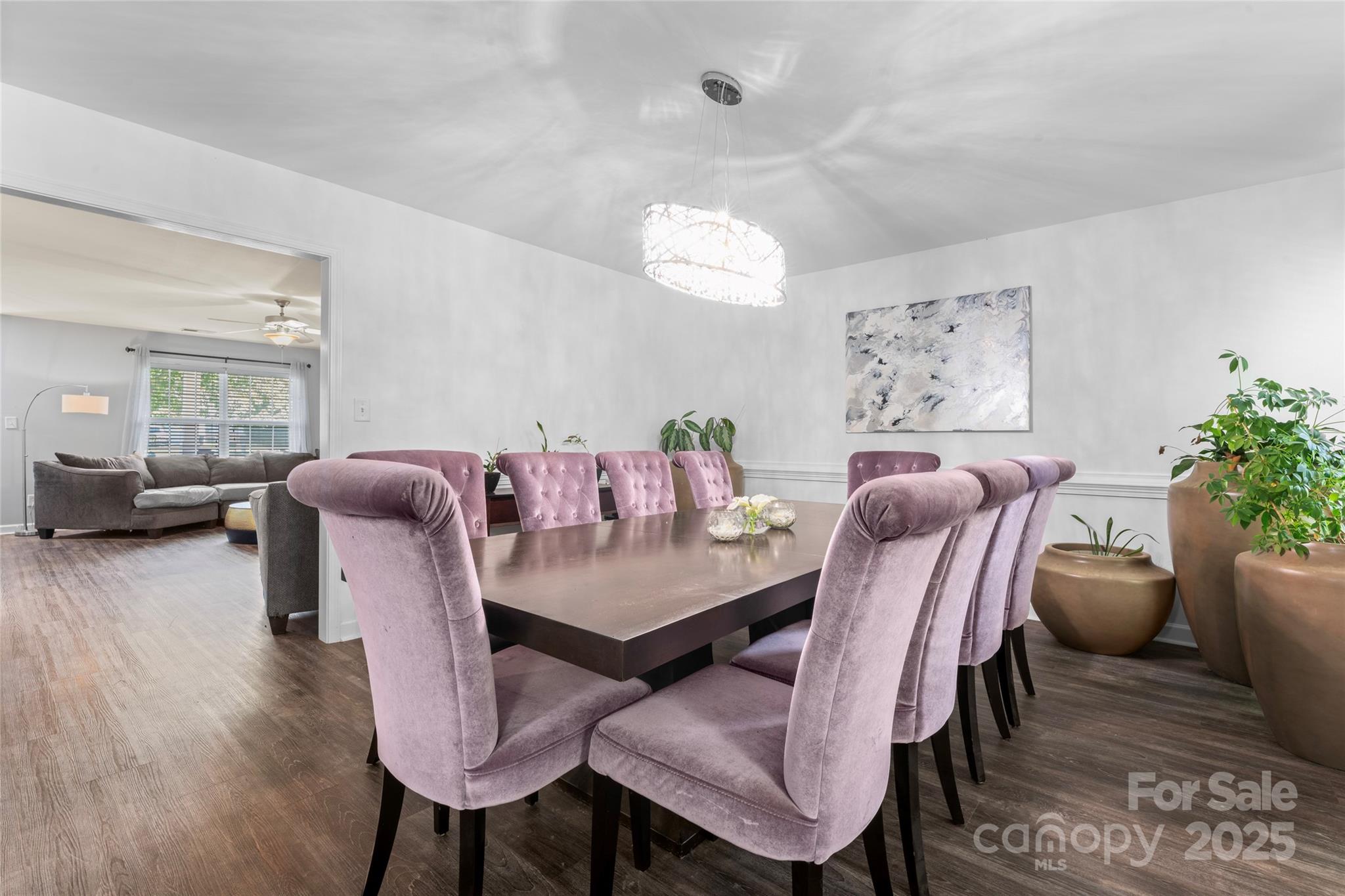 2909 Blueberry Drive Monroe, NC 28110 - Photo 13 of 37 a view of a dining room with furniture and wooden floor