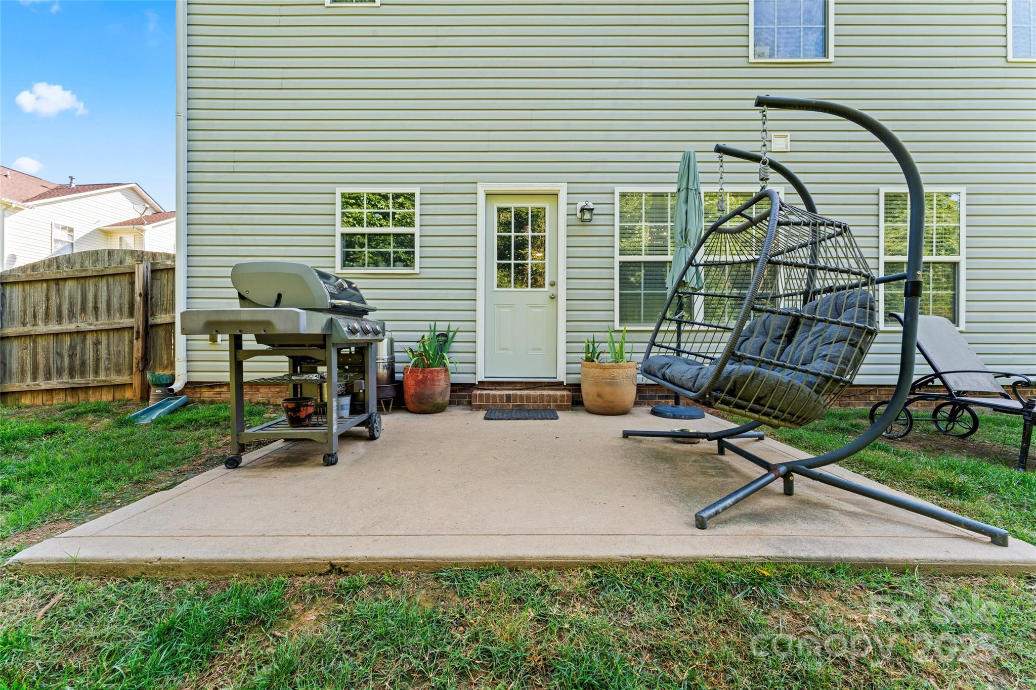 2909 Blueberry Drive Monroe, NC 28110 - Photo 31 of 37 a backyard of a house with seating space