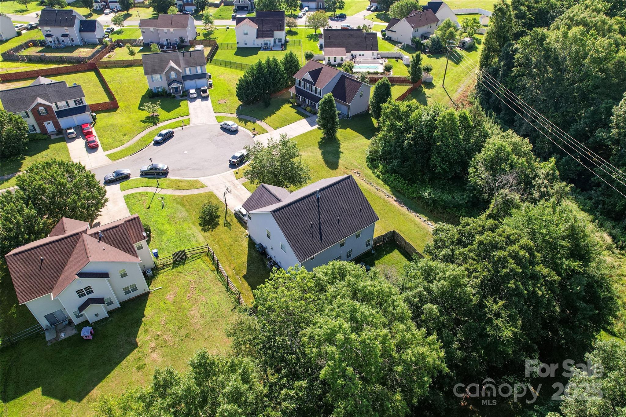 2909 Blueberry Drive Monroe, NC 28110 - Photo 35 of 37 an aerial view of a house with swimming pool and outdoor seating