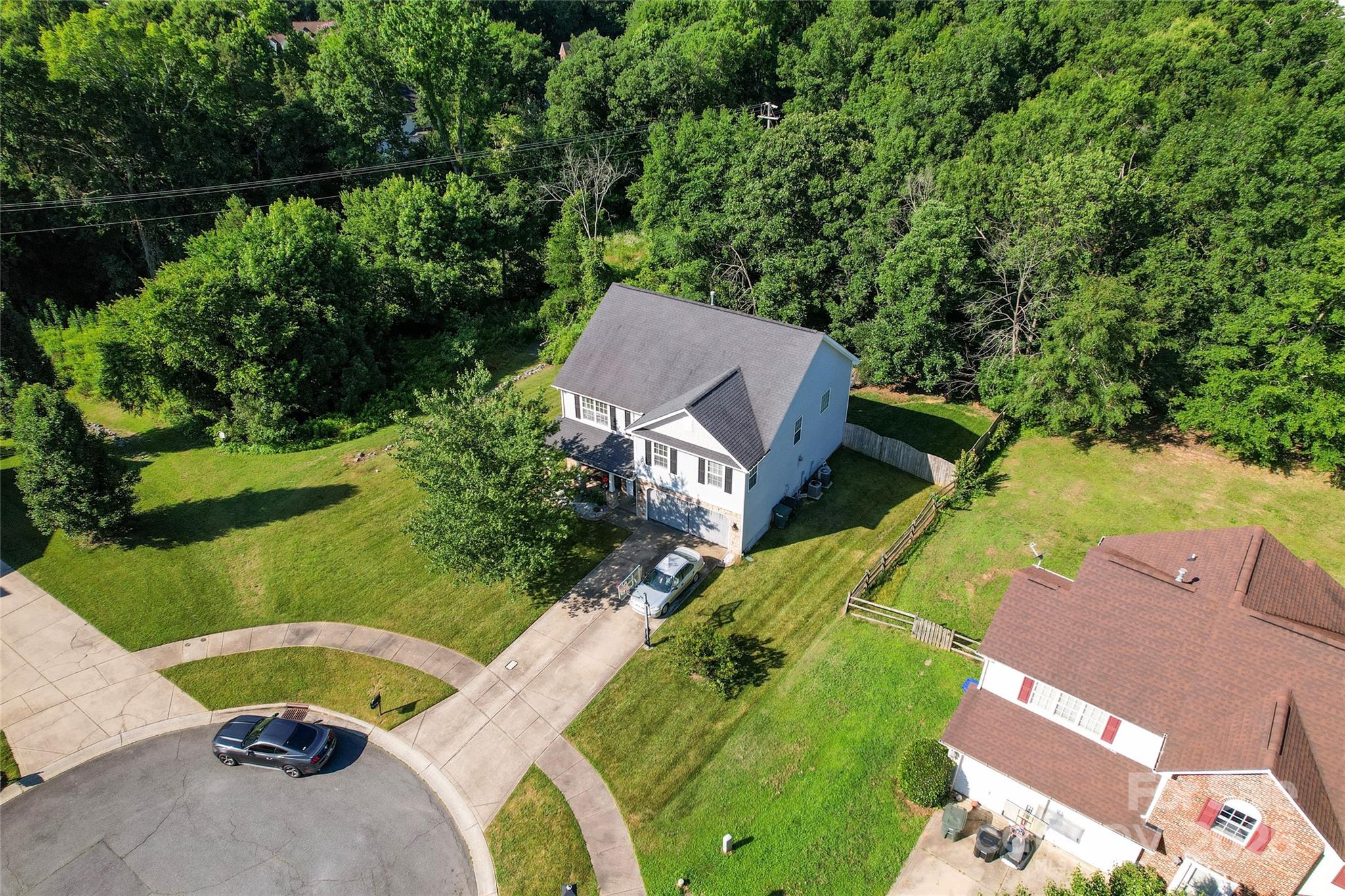 2909 Blueberry Drive Monroe, NC 28110 - Photo 37 of 37 an aerial view of a house with a yard and lake view