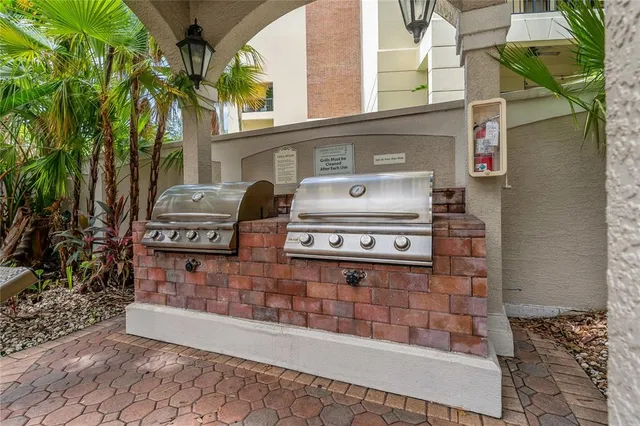 a workspace with furniture and a potted plant