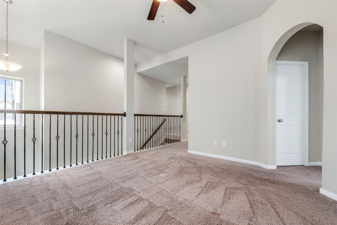 5203 Prairie Terrace Lane Fulshear, TX 77441 - Photo 12 of 32 a view of a livingroom with a staircase