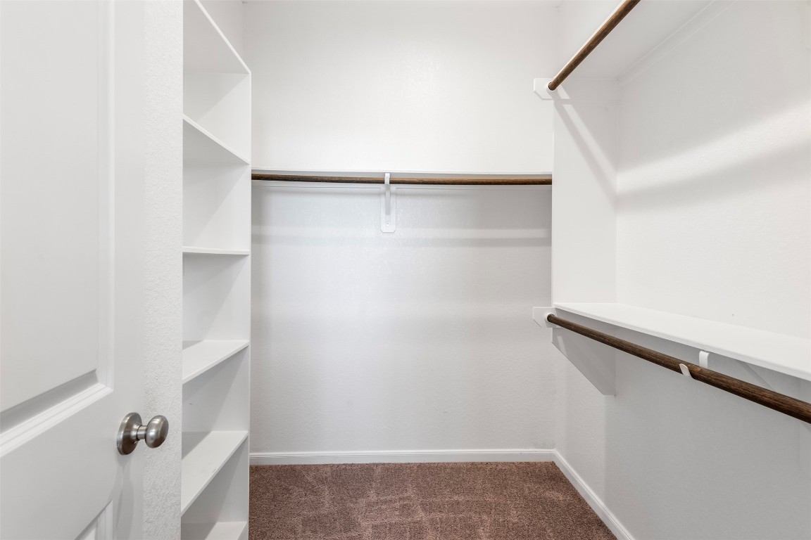5203 Prairie Terrace Lane Fulshear, TX 77441 - Photo 18 of 32 a view of an empty walk in closet