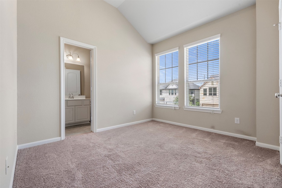 5203 Prairie Terrace Lane Fulshear, TX 77441 - Photo 20 of 32 a view of an empty room with a window