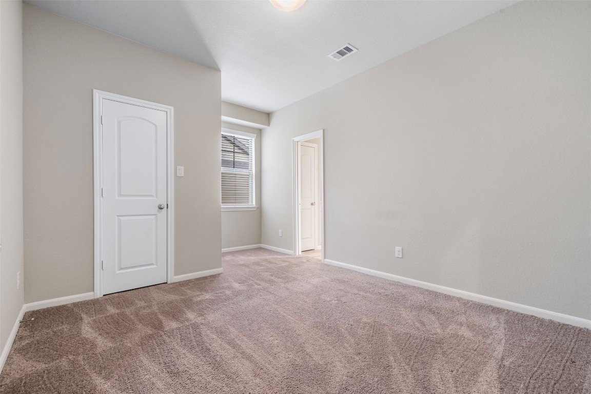 5203 Prairie Terrace Lane Fulshear, TX 77441 - Photo 22 of 32 an empty room with closet area