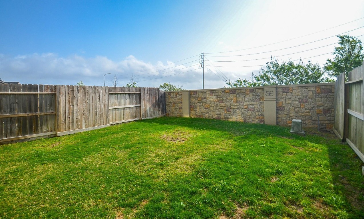5203 Prairie Terrace Lane Fulshear, TX 77441 - Photo 24 of 32 a view of a back yard