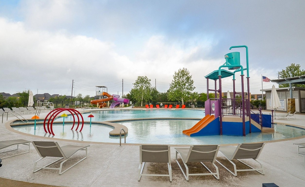 5203 Prairie Terrace Lane Fulshear, TX 77441 - Photo 27 of 32 an outdoor space with seating