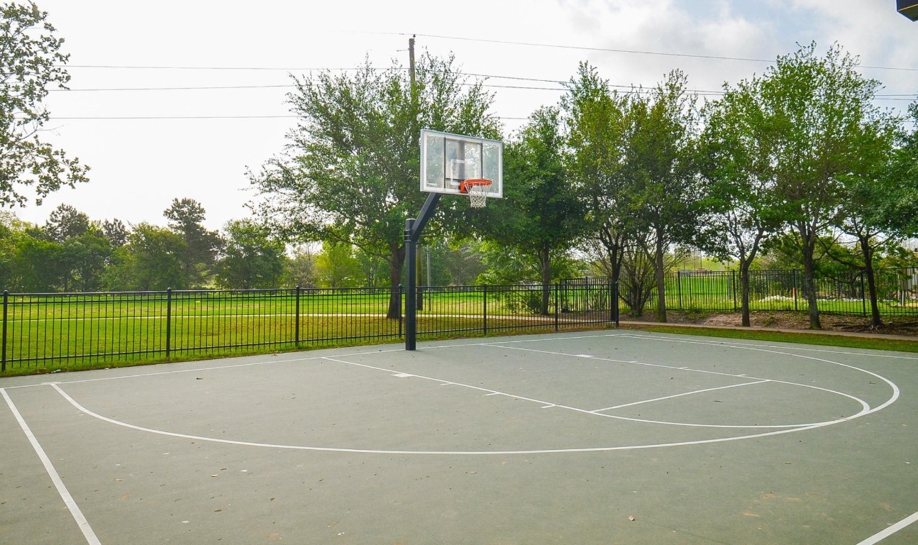 5203 Prairie Terrace Lane Fulshear, TX 77441 - Photo 30 of 32 a view of a tennis court