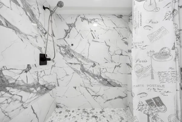 a white marble wall with a snow