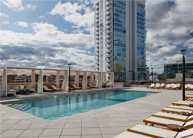 a view of a balcony with city view