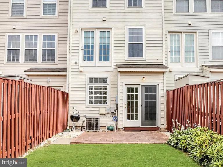 44480 Watertown Terrace Ashburn, VA 20147 - Photo 22 of 22 front view of a house with a yard