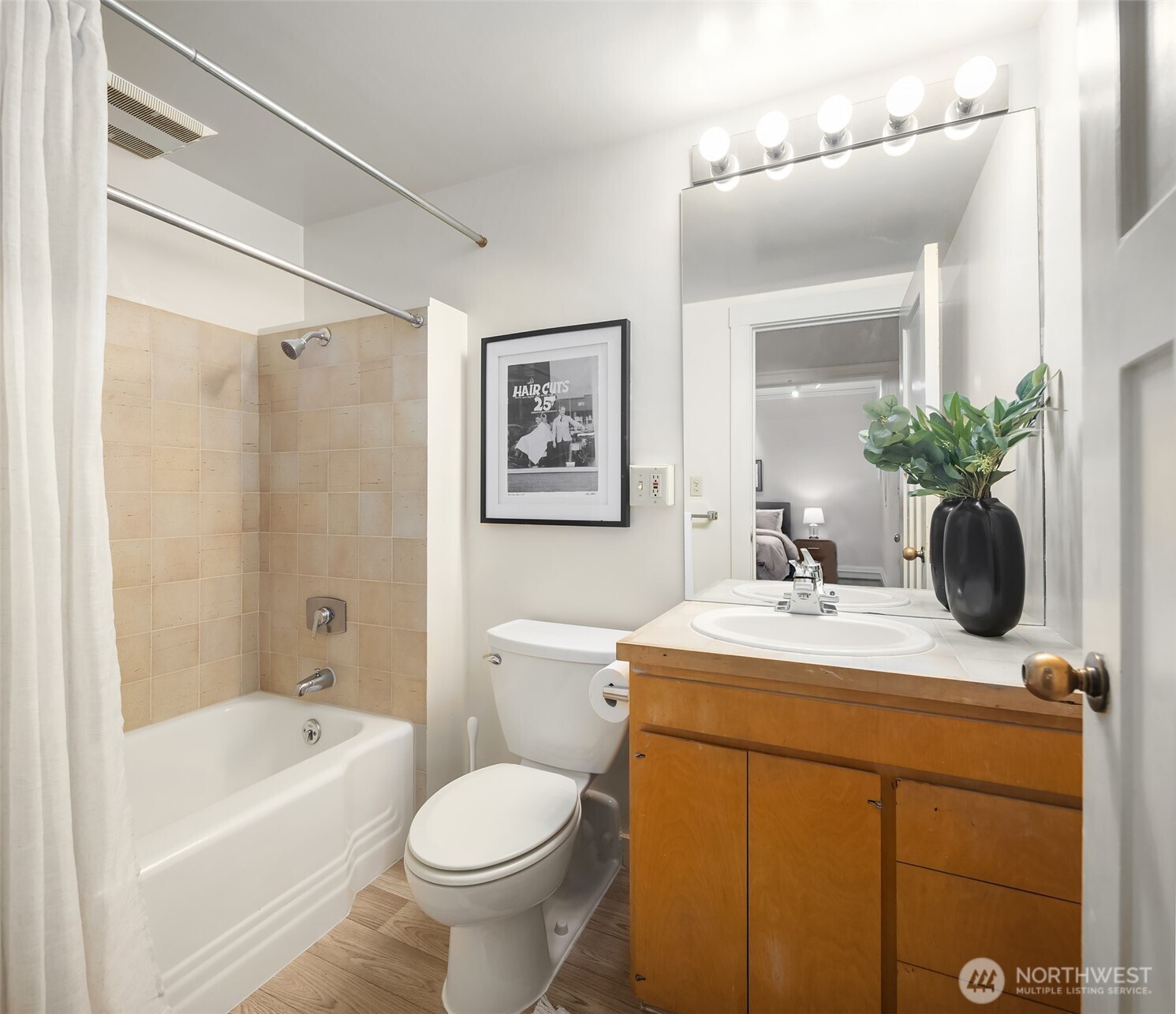 1519 3rd Avenue, Unit 801 Seattle, WA 98101 - Photo 27 of 40 a bathroom with a sink toilet and shower