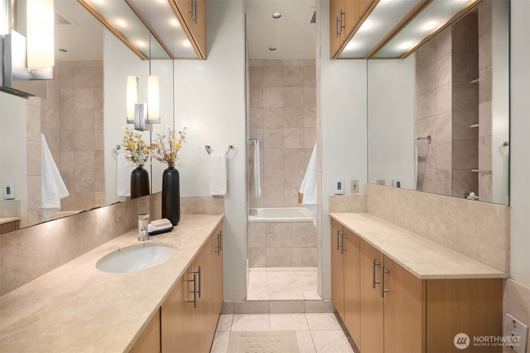 1519 3rd Avenue, Unit 801 Seattle, WA 98101 - Photo 30 of 40 a bathroom with a granite countertop sink and a bathtub