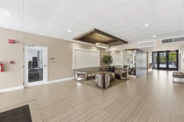 a view of a living room and dining room