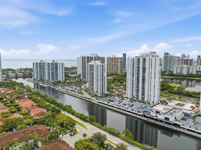 a view of a city with tall buildings