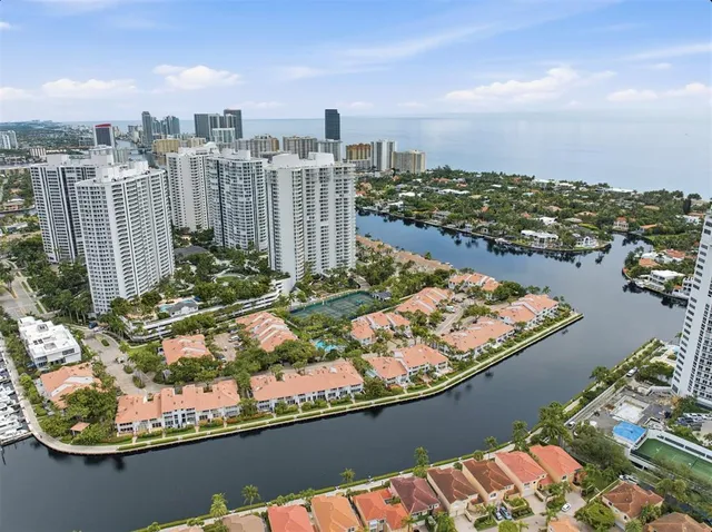 a view of a city and lake