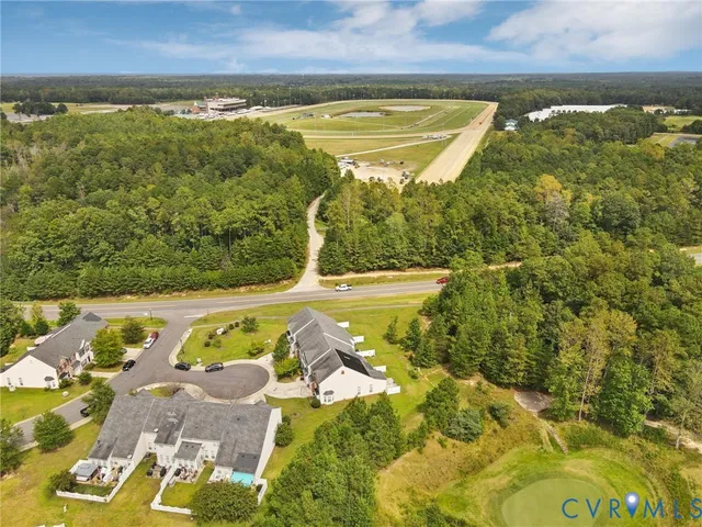 a view of a swimming pool and an outdoor seating
