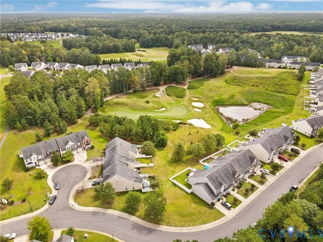 a view of a swimming pool with a lake view
